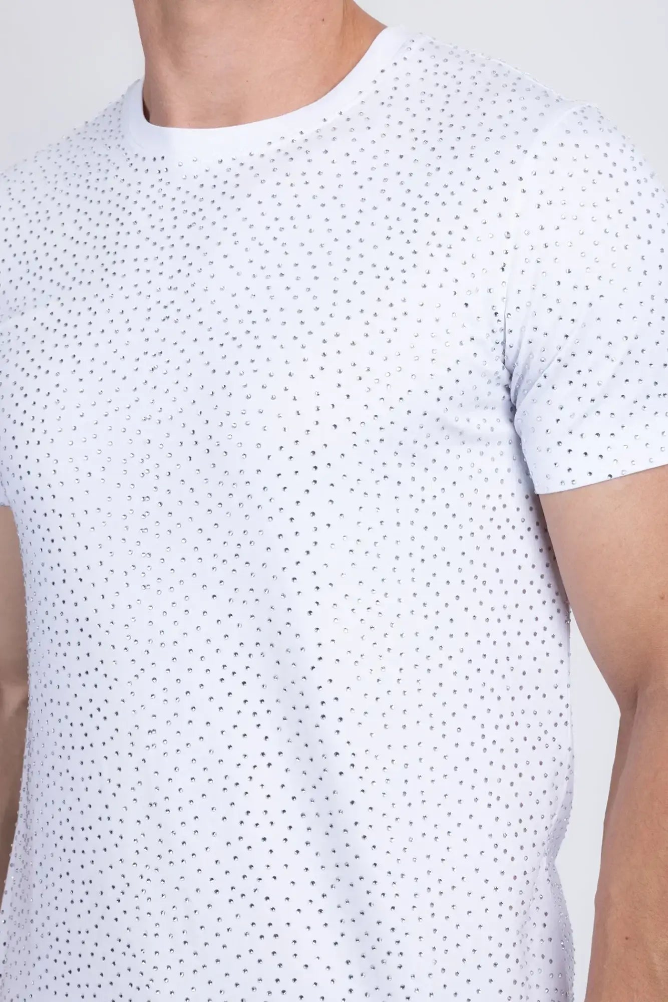 White short-sleeved Dolorosa rhinestone t-shirt with subtle tiny black dot pattern across the fabric