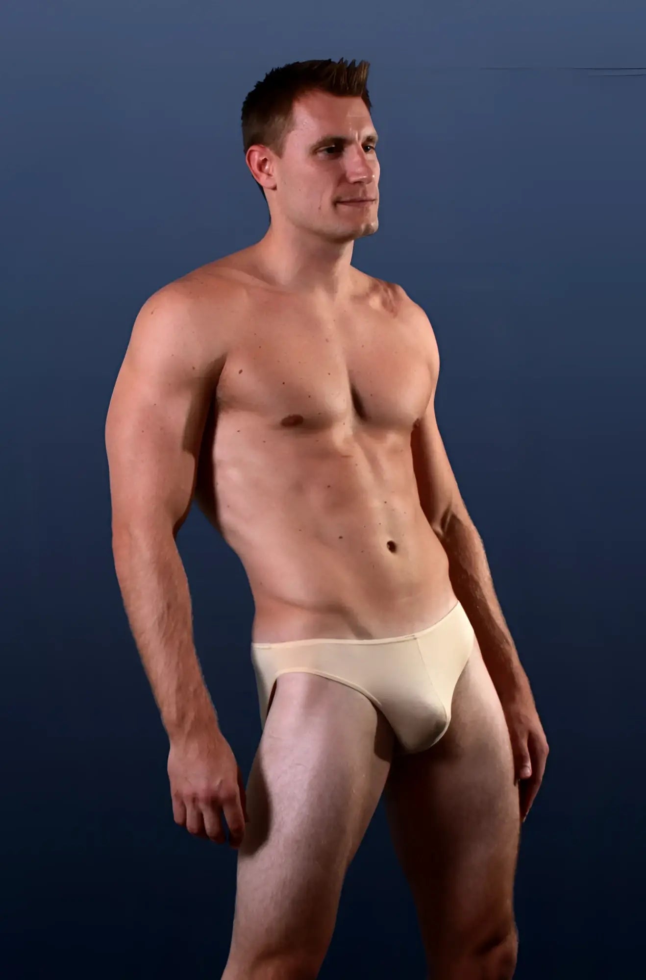 Beige Doreanse 1281-TAN hang-loose bikini briefs worn by a man showing front fit and tan color