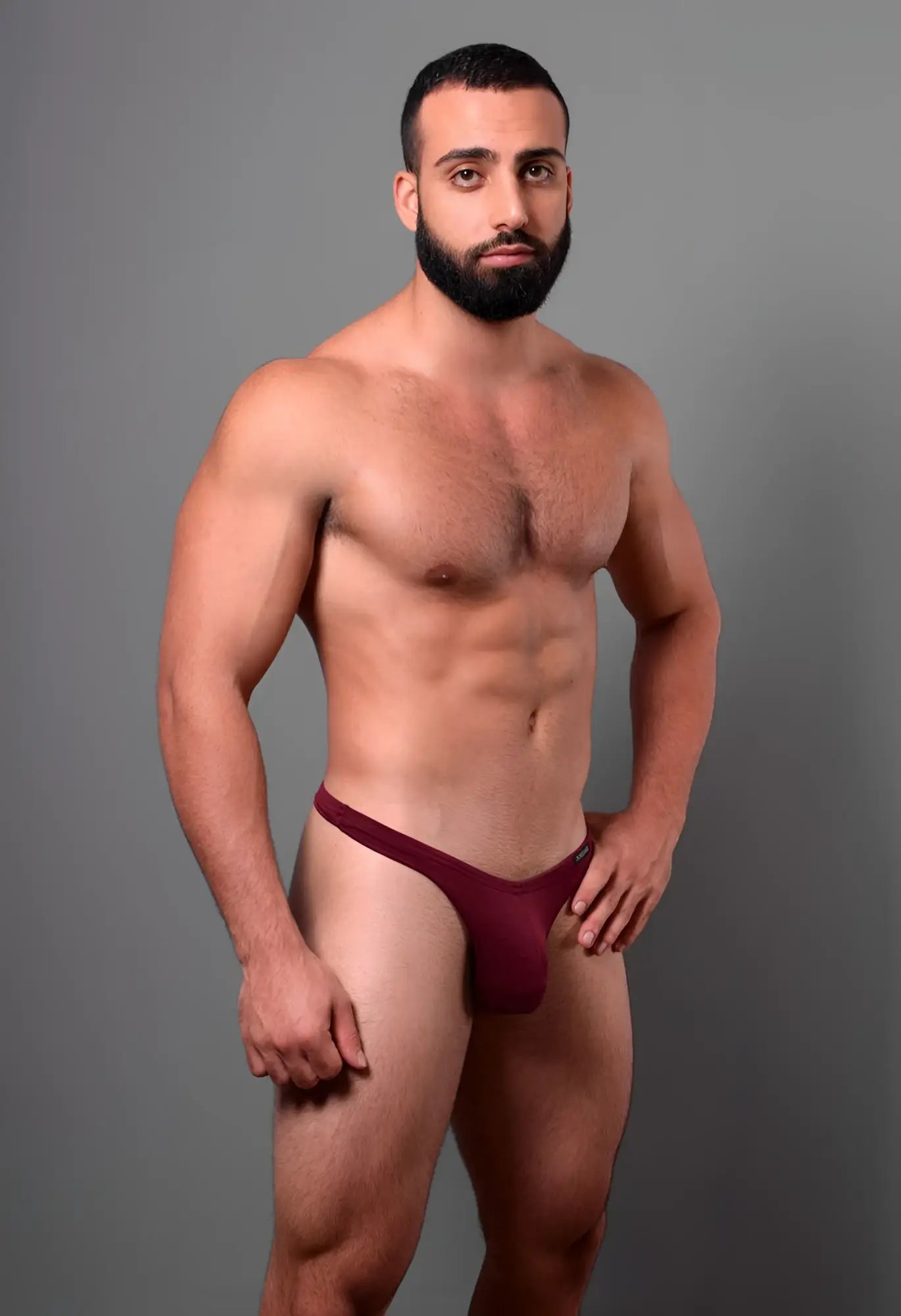 Doreanse 1392-BRD euro thong in bordeaux maroon made of smooth stretchy fabric shown from the back side