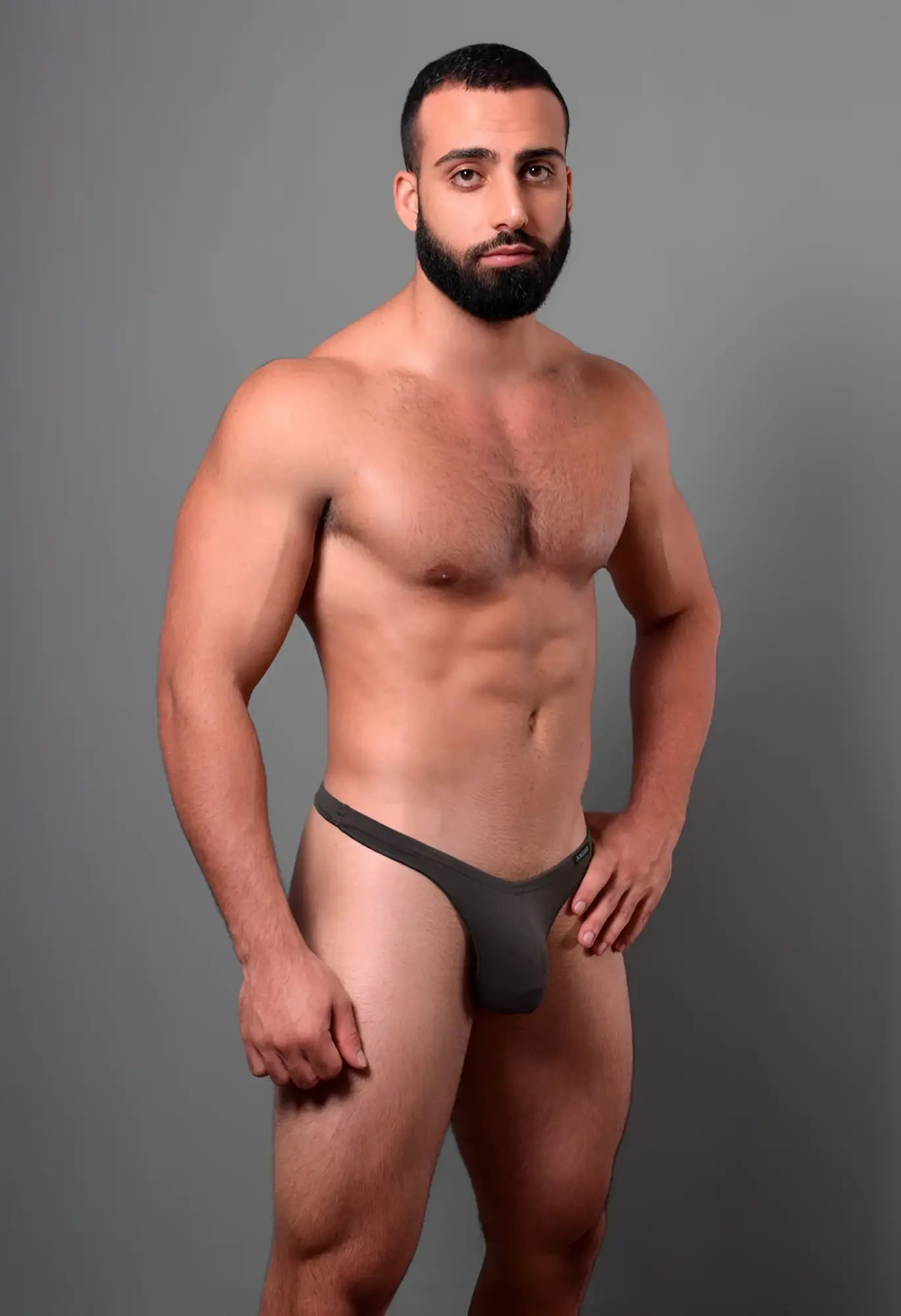 Dark gray seamless form-fitting thong with narrow waistband and smooth fabric by doreanse smoke color visible from back side