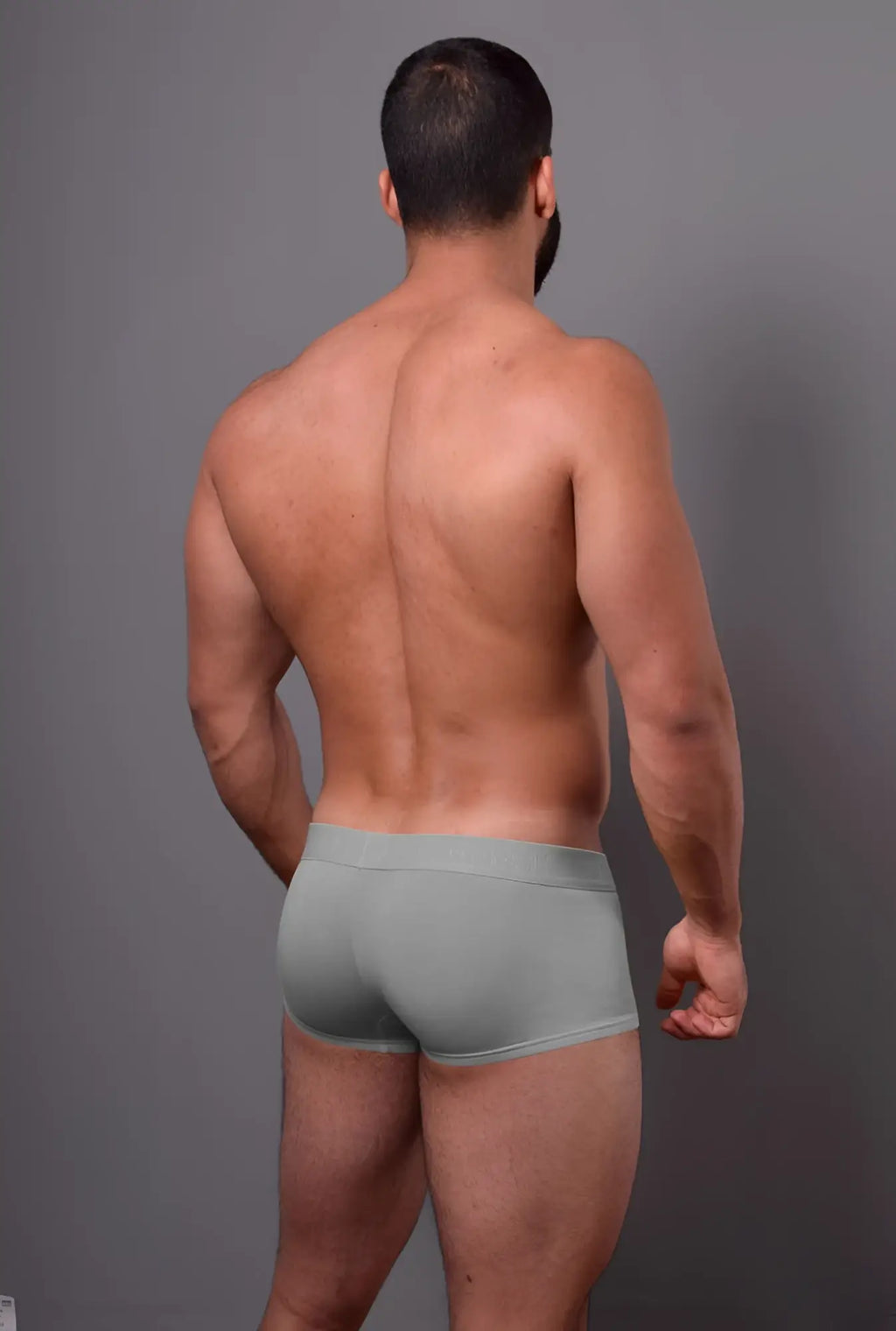 A pair of doreanse 1760-gry low-rise gray briefs worn by a man featuring light gray fabric and form-fitting design