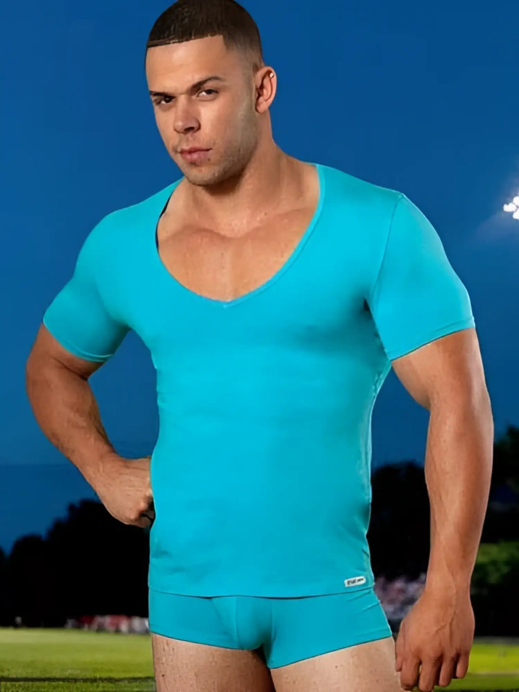 Doreanse deep v neck short sleeved athletic shirt in turquoise size 2XL made of breathable fabric