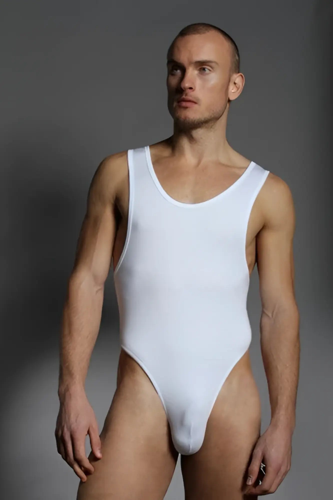 White doreanse tank top thong bodysuit size m with scoop neckline and high cut legs in form fitting fabric