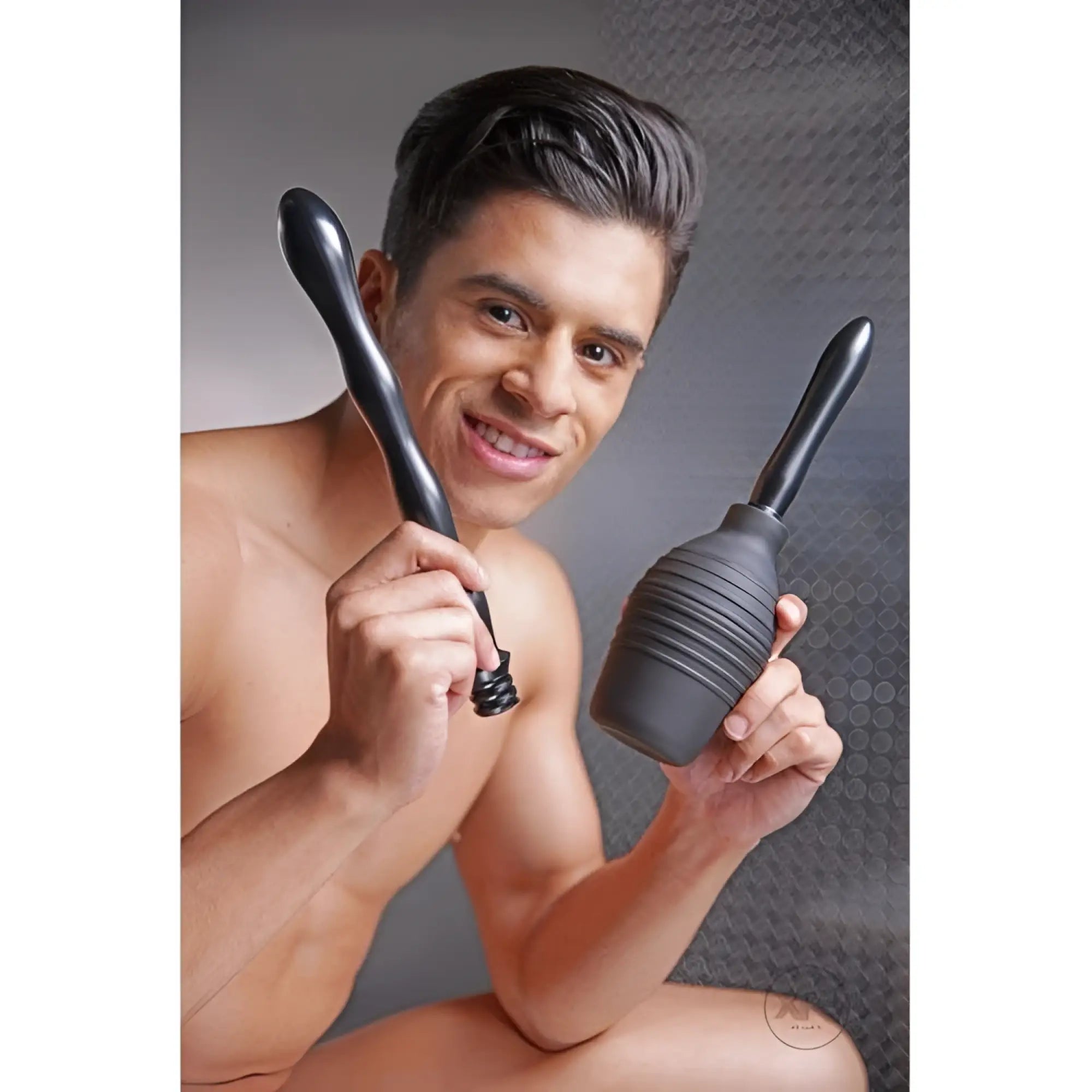 Black silicone double tip enema bulb system with ribbed texture and tapered nozzle for anal douching use