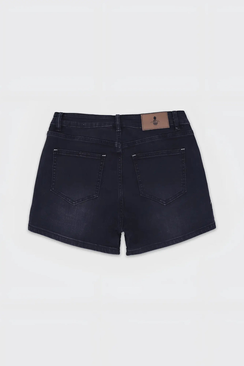 Back view of dark-wash in-your-dreams 3.5 inch denim short shorts with classic pocket design and brown leather patch