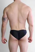 Black ruched swim trunks with scrunch butt detail in jet black for dynamic classic brief style swimwear