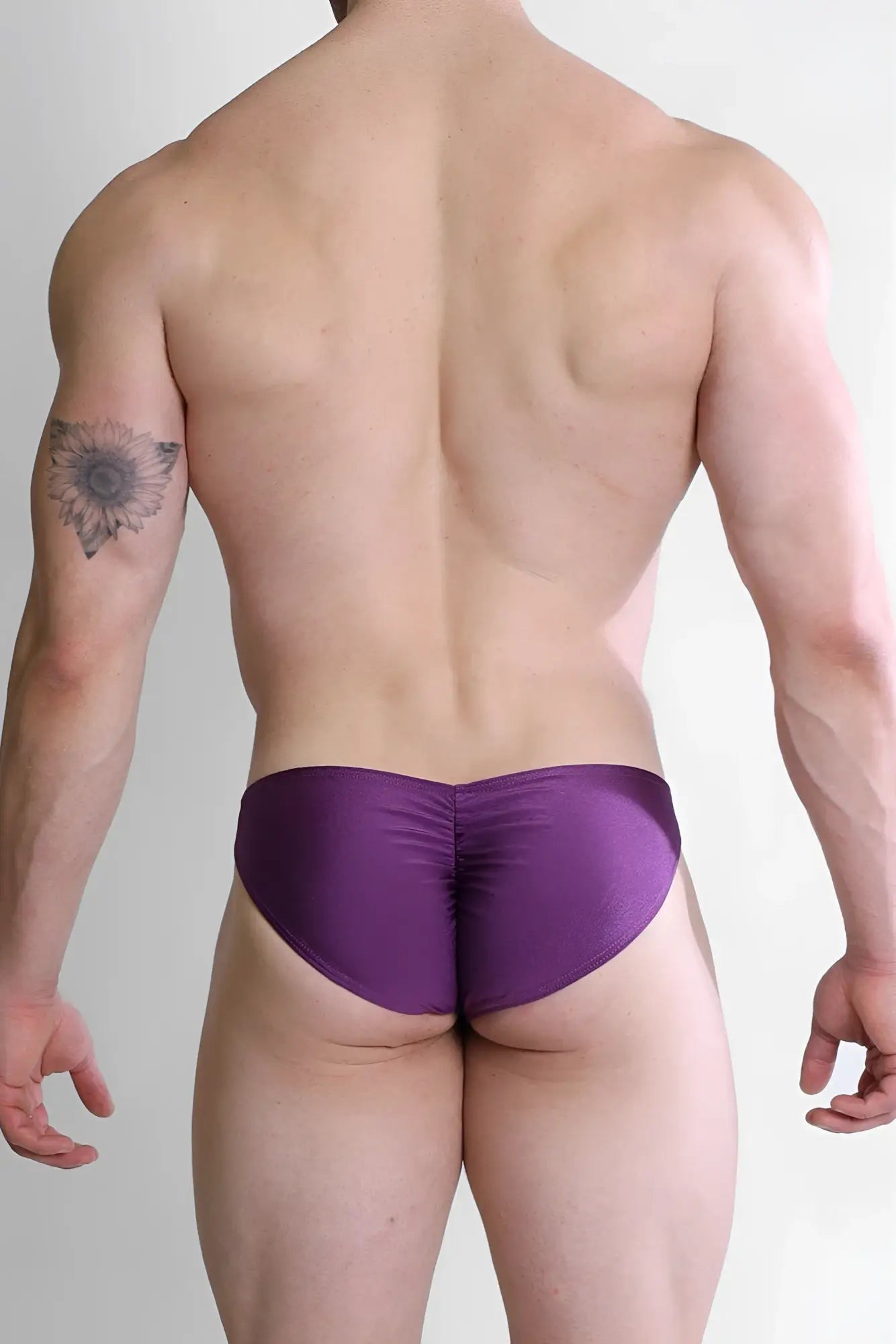 Purple satin dynamic classic scrunch-butt briefs showing the ruched back detail for a flattering fit