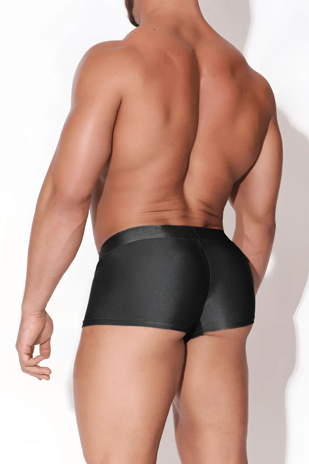 Dynamic sheen boxer briefs in midnight black featuring shiny, smooth, form-fitting material for sleek comfort