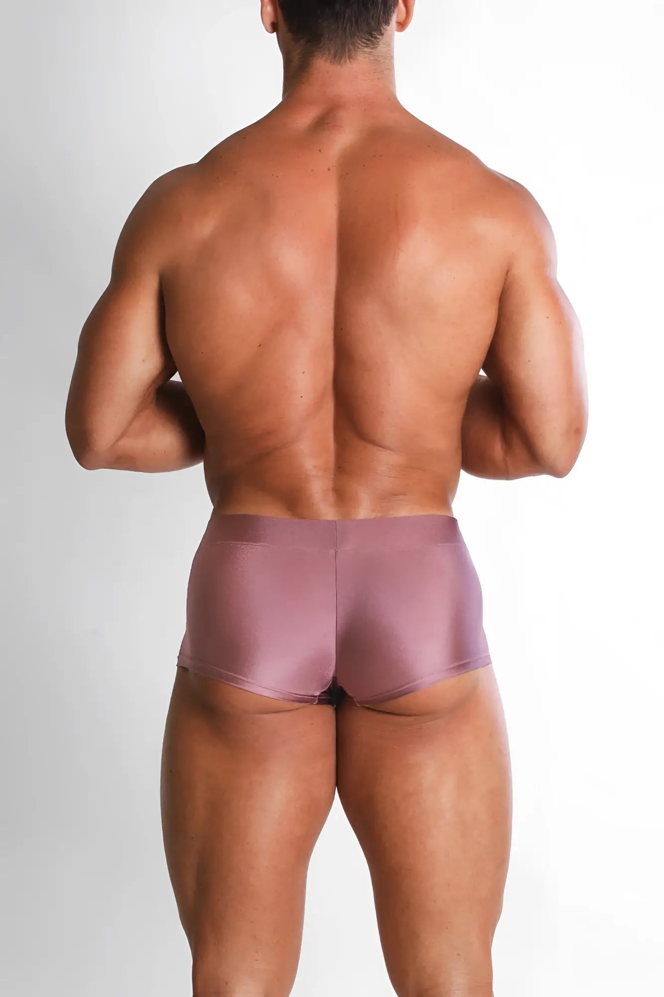 The mauve satin dynamic sheen boxer briefs feature a sleek, form-fitting design with a smooth, glossy finish