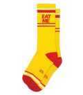 Bright yellow eat me crew socks with red accents and bold red eat me text on the cuff