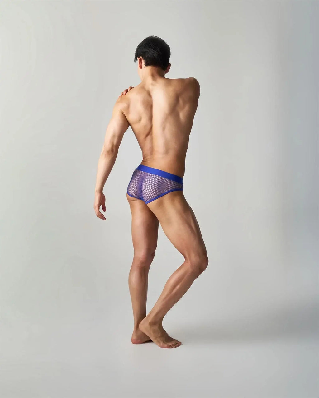 Blue mesh edge net brief with solid blue waistband featuring breathable lightweight fabric for everyday comfort
