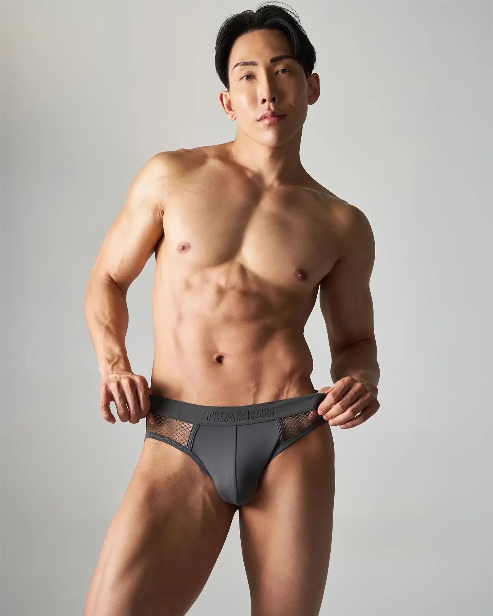 Dark gray calvin klein edge net brief with mesh side panels offering breathable comfort and modern style