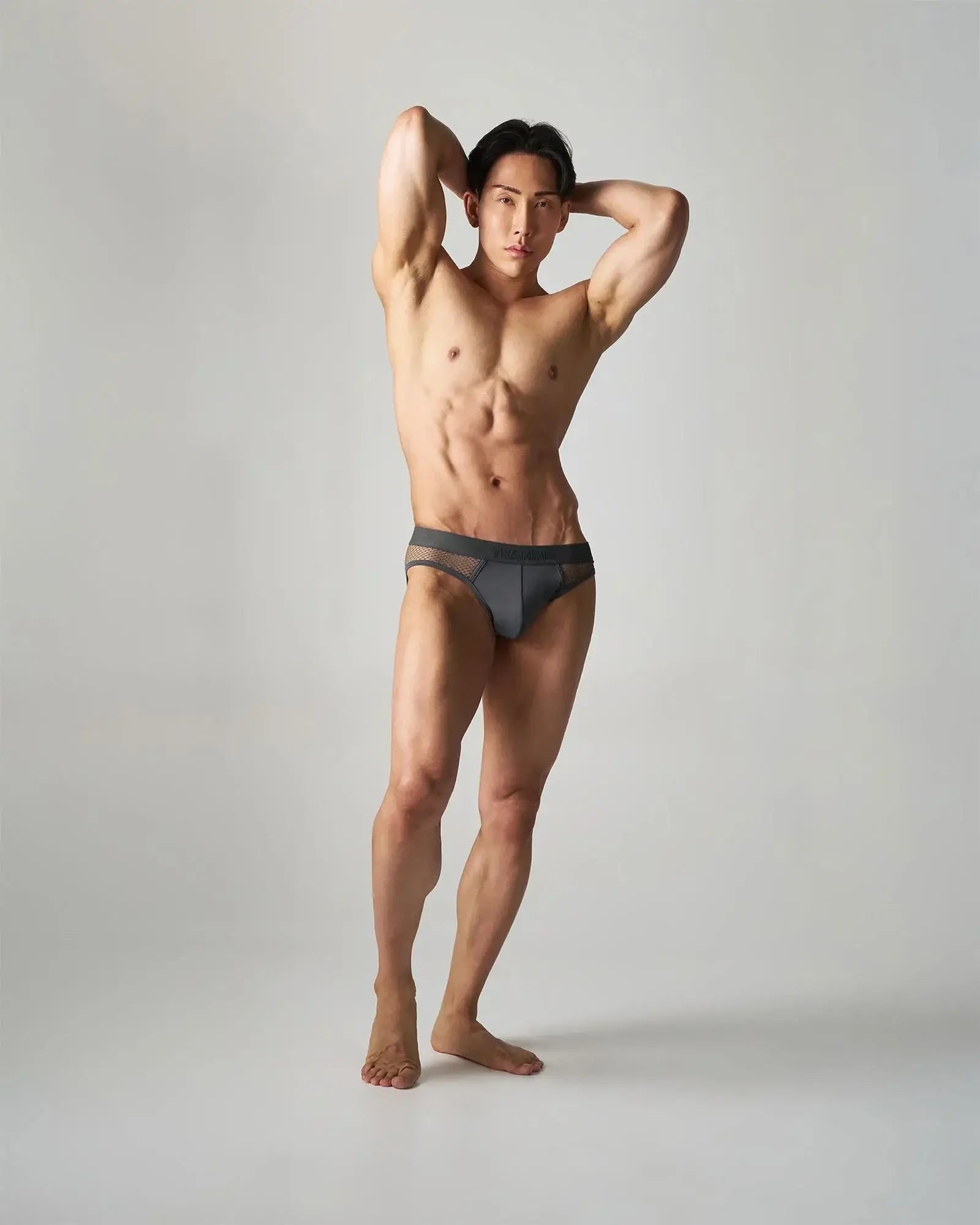 Dark gray mesh-trimmed briefs edge net brief featuring breathable mesh panels for comfortable daily wear