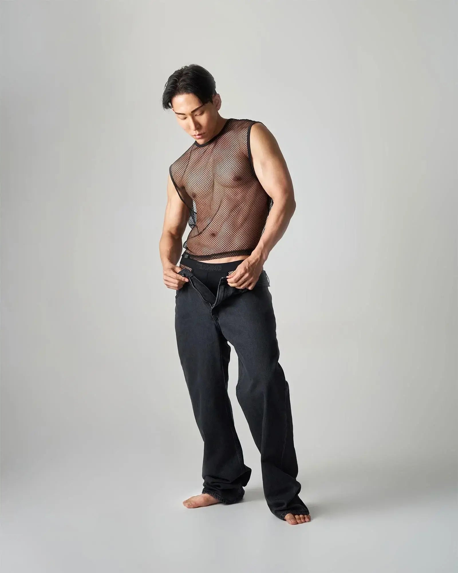 Black edge net mesh muscle tank top with sheer semi transparent mesh design for a stylish breathable look