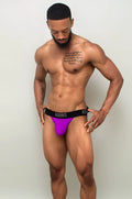 Electric purple night cap jock-thong athletic briefs in purple and black with adonis branding on waistband