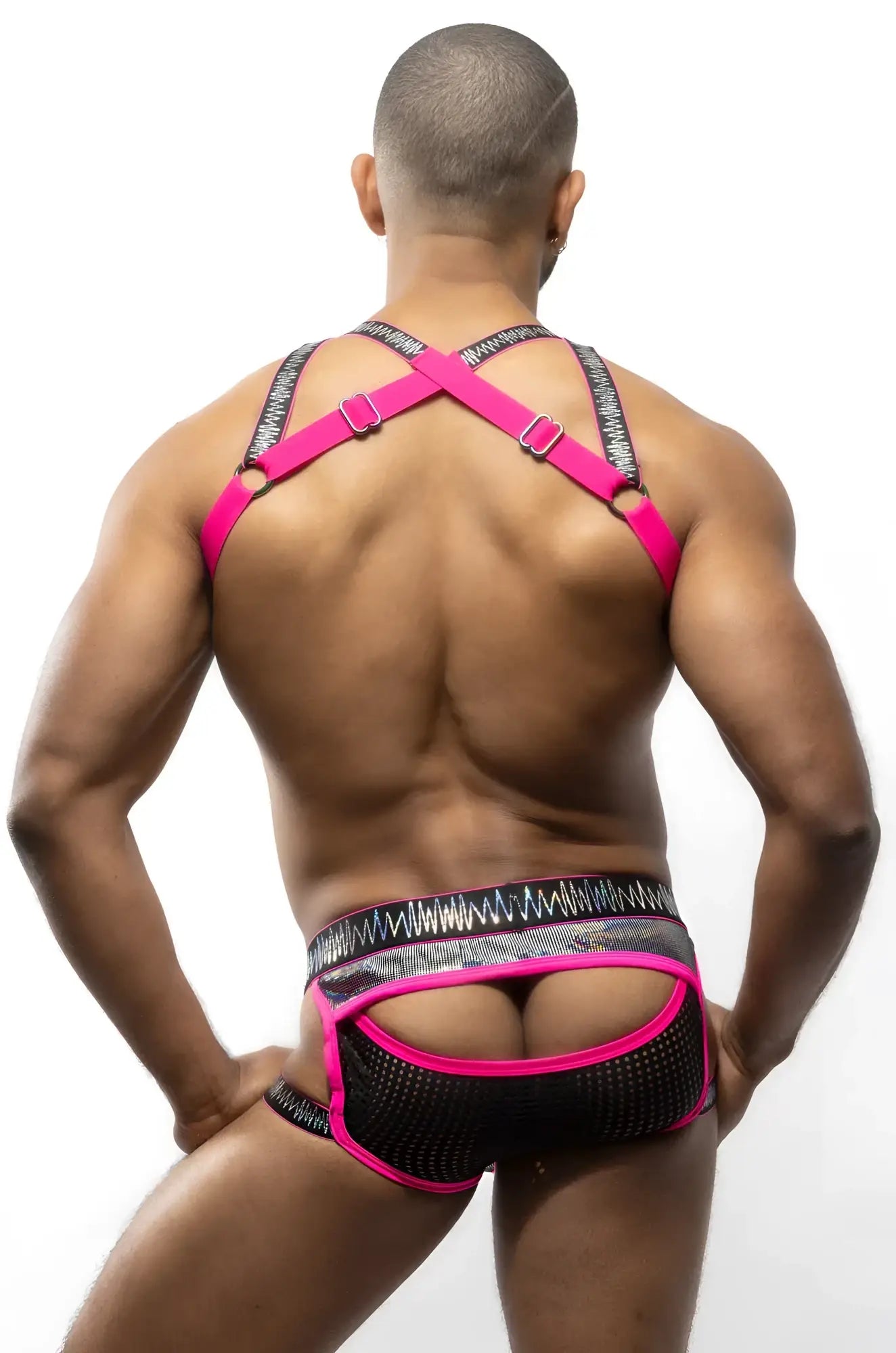 Bright pink and black mesh harness style underwear with a bold patterned waistband from the electro holographic collection