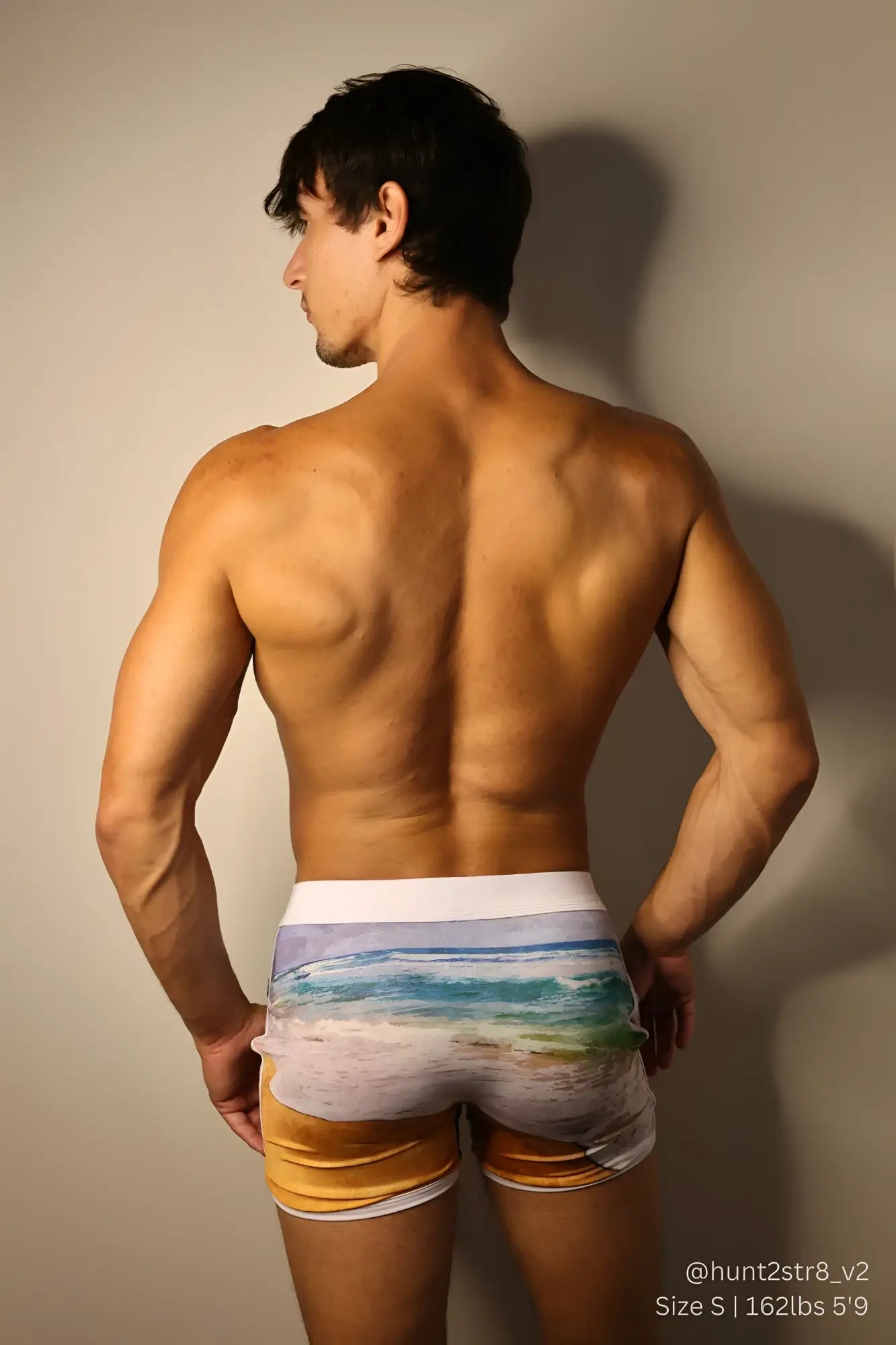 Elevate comfort 4 inch men’s beach-themed swim trunks with ocean sand print white waistband and gold trim