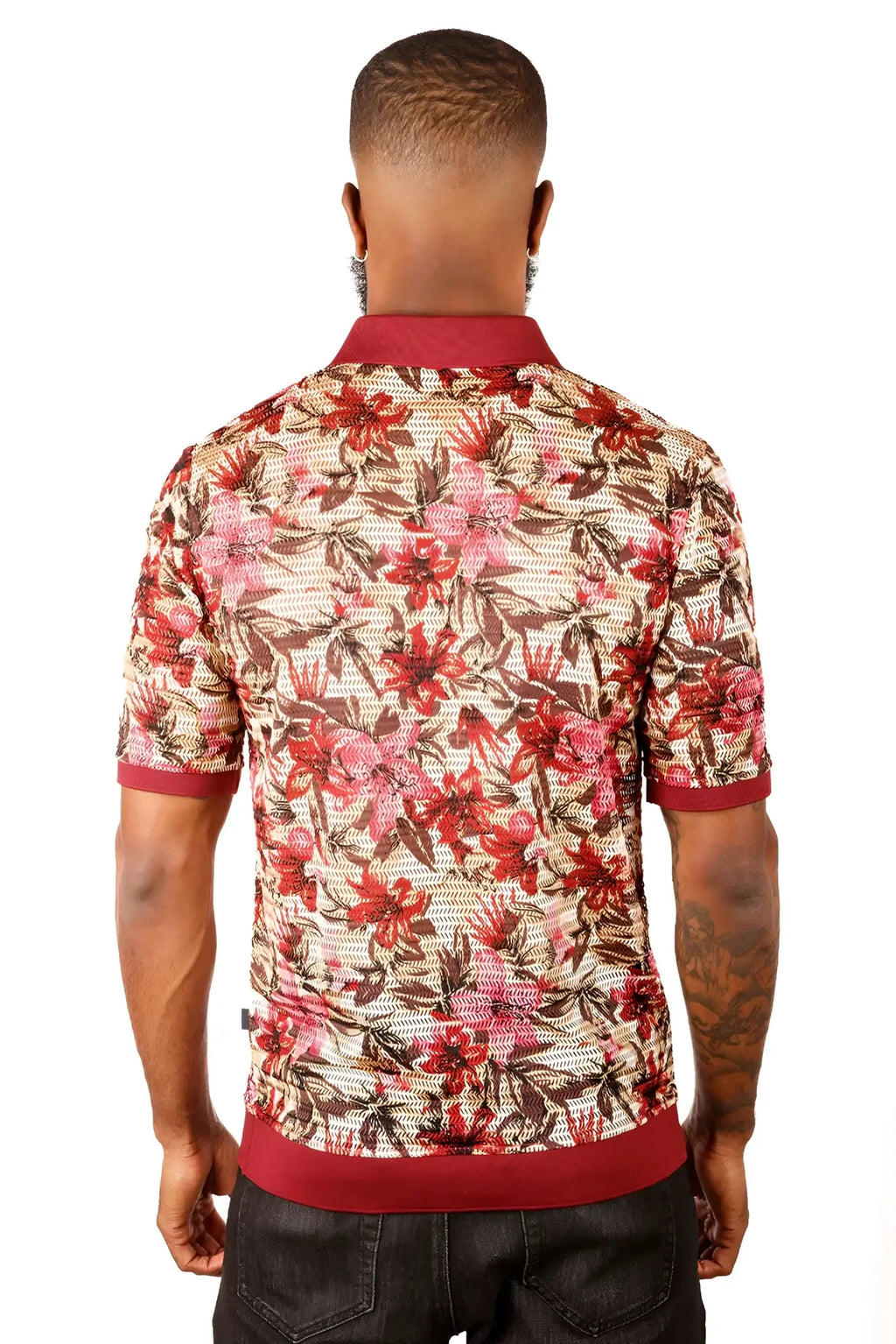 A man wearing an entwin form polo shirt with a vibrant red floral pattern on beige mesh and maroon accents