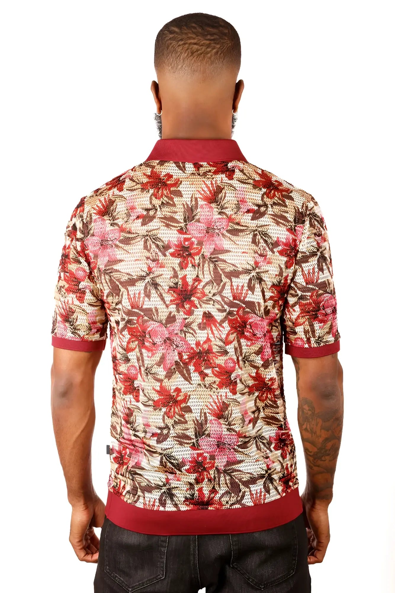 A man wearing an entwin form polo shirt with a vibrant red floral pattern on beige mesh and maroon accents
