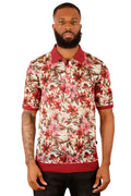 A man wearing an entwine form polo shirt with red and brown floral pattern and maroon collar on beige background