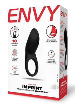 Black silicone vibrating stamina ring with textured ridged surface and central hole by Envy Toys Imprint