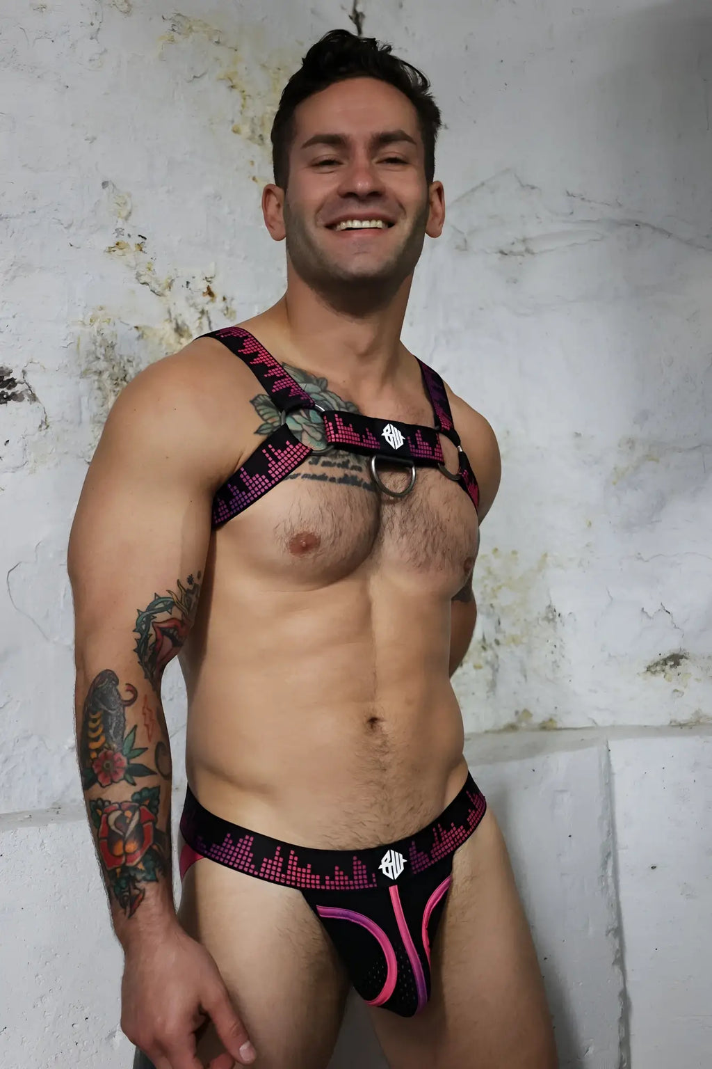 Equalizer bulldog harness black and pink patterned harness-style lingerie with diamond-shaped logo on chest strap