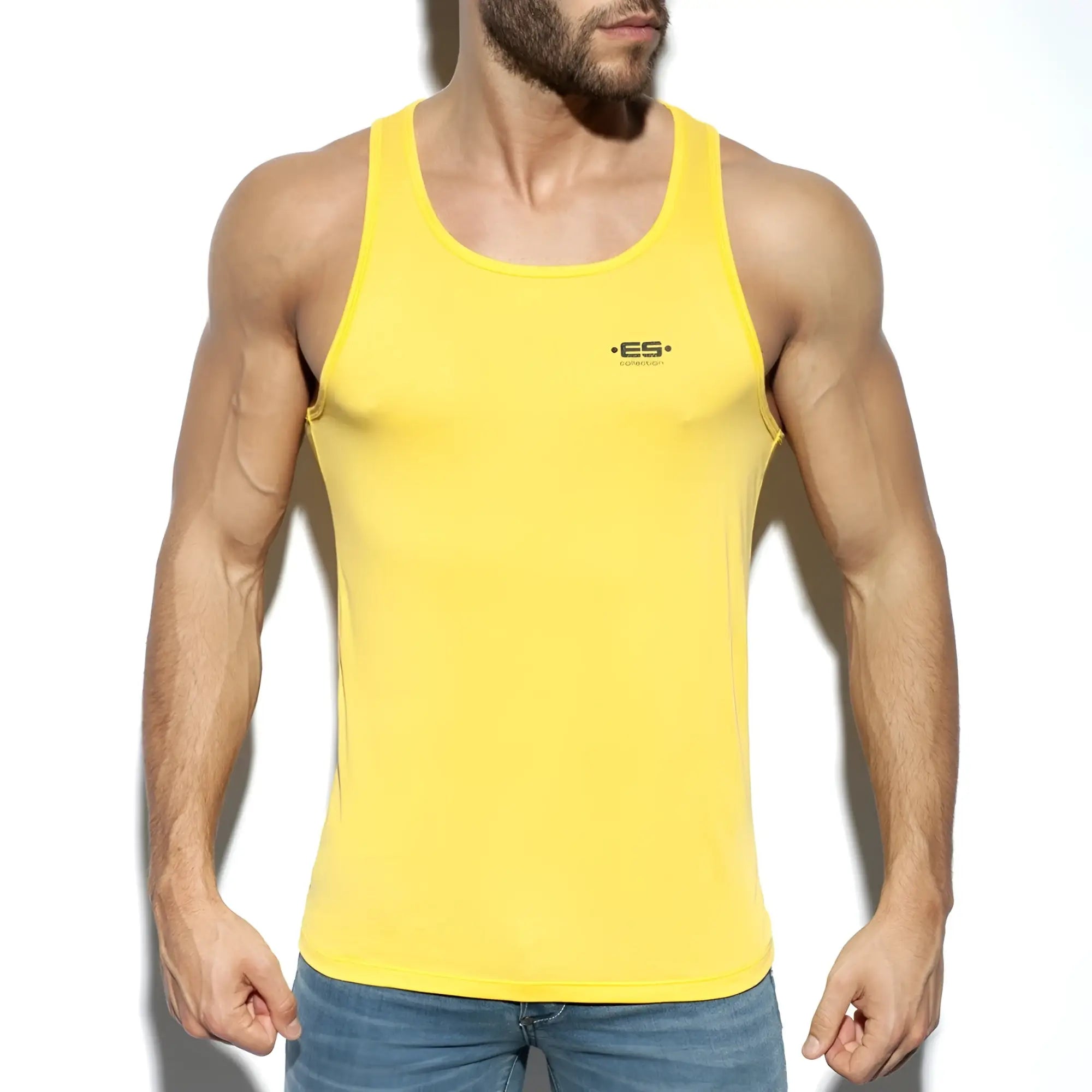 Bright yellow es basic tank sleeveless top with small black logo on chest perfect for casual wear