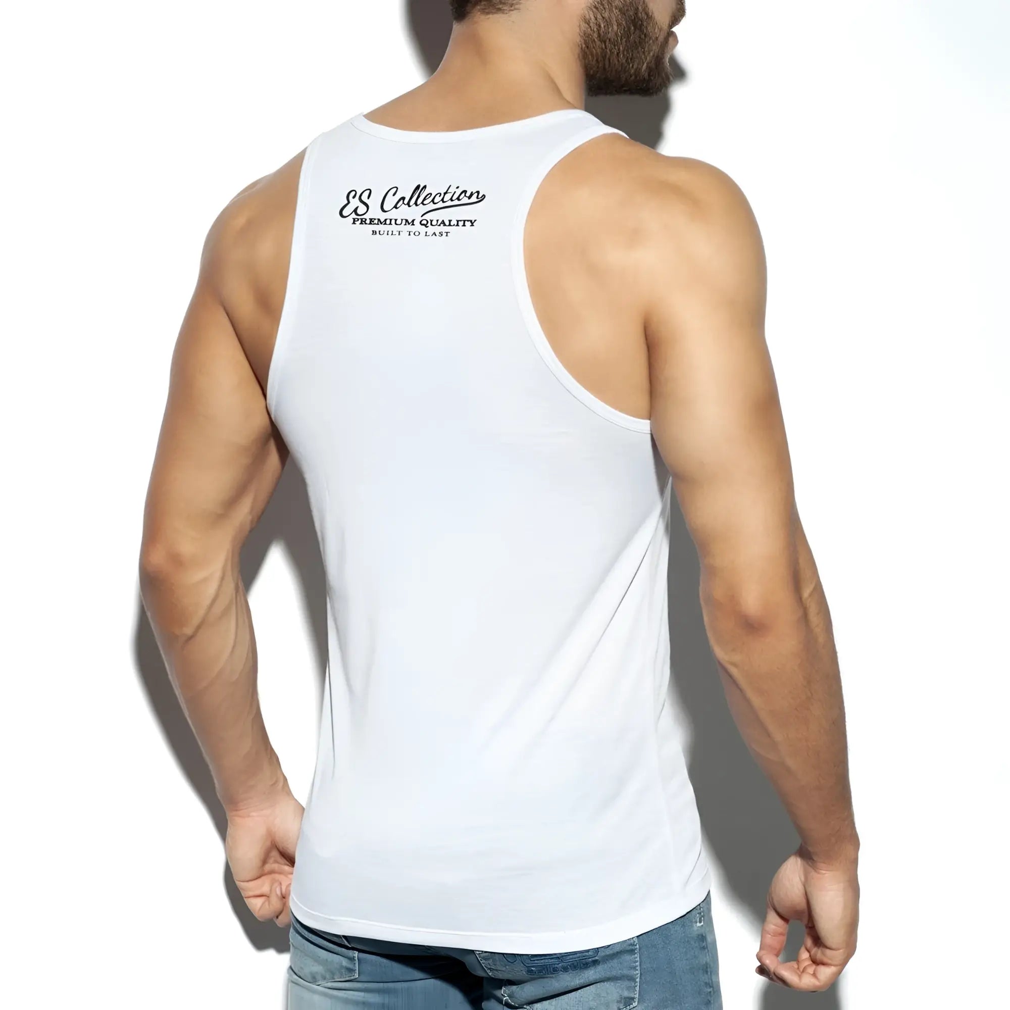 White men’s tank top showing the back with black es collection branding in the es basic tank design