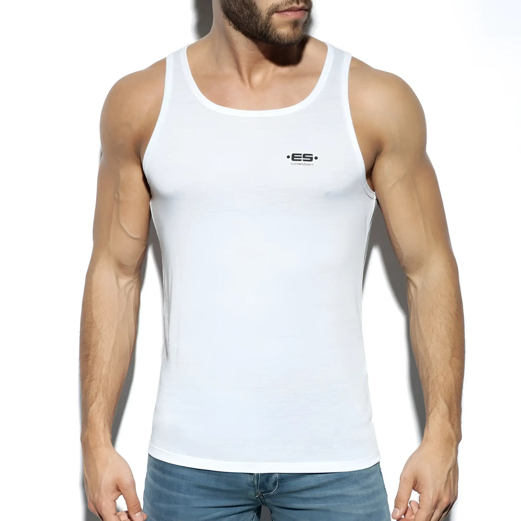 White men’s cotton tank top with small black es basic tank logo on the chest for casual wear