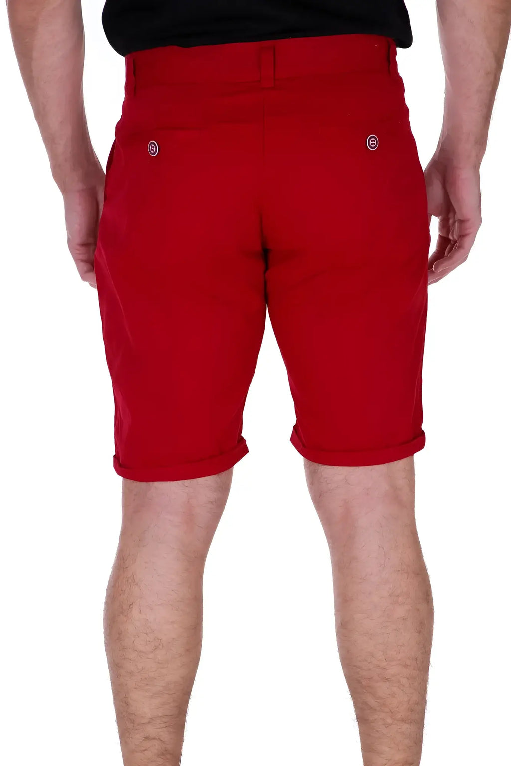 Red cotton chino shorts with rolled cuffs and circular brand logos on back pockets shown from the back side