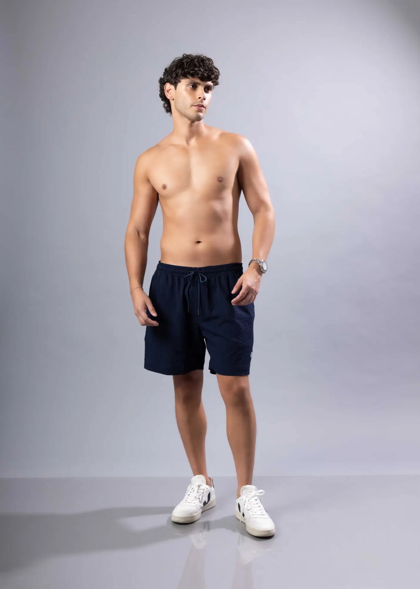 Navy blue essential swim short with drawstring waistband made for swimming and casual wear available in three colors