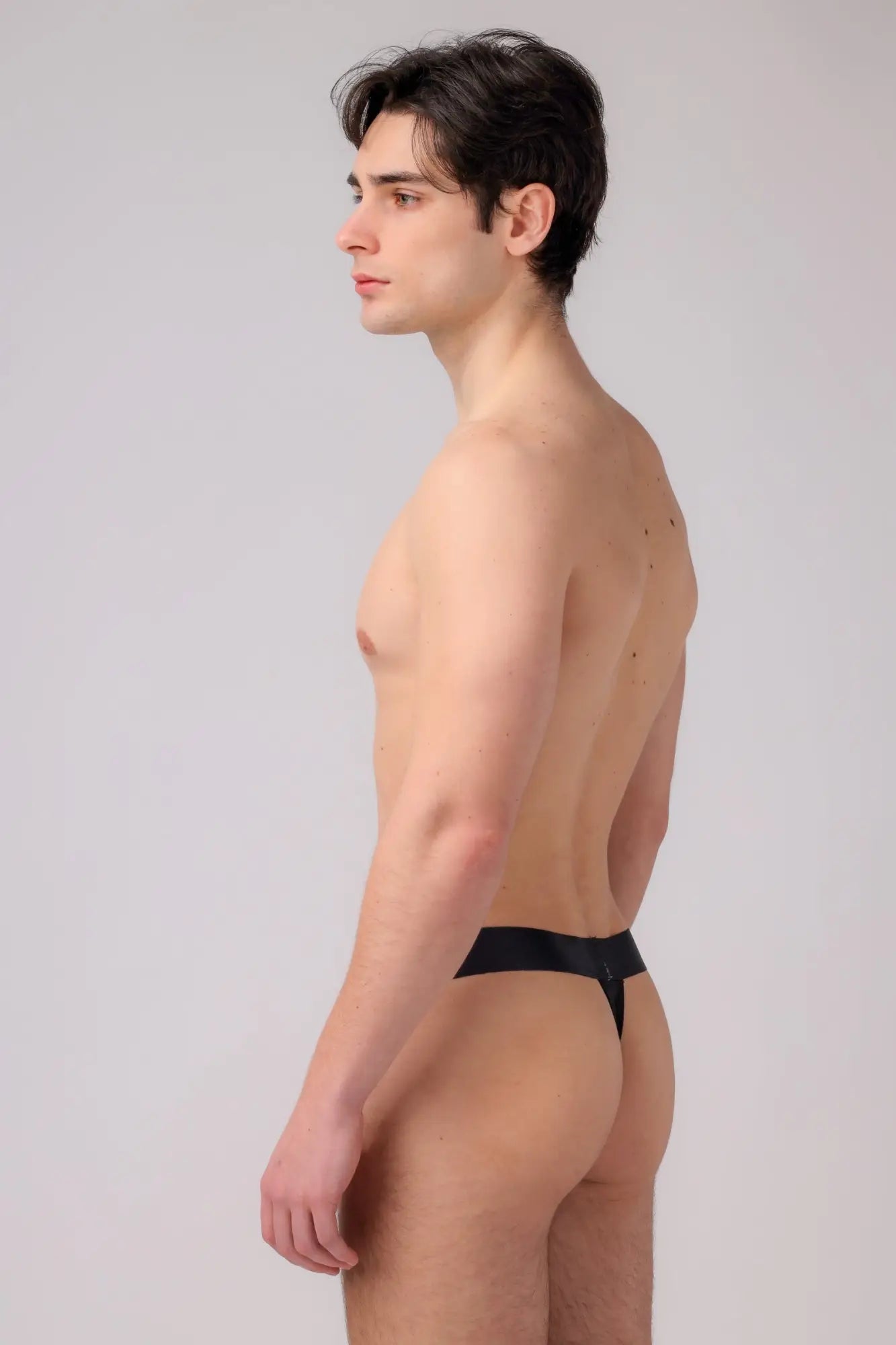 Black AS exclusive thong underwear with a smooth sleek design and comfortable lightweight fabric