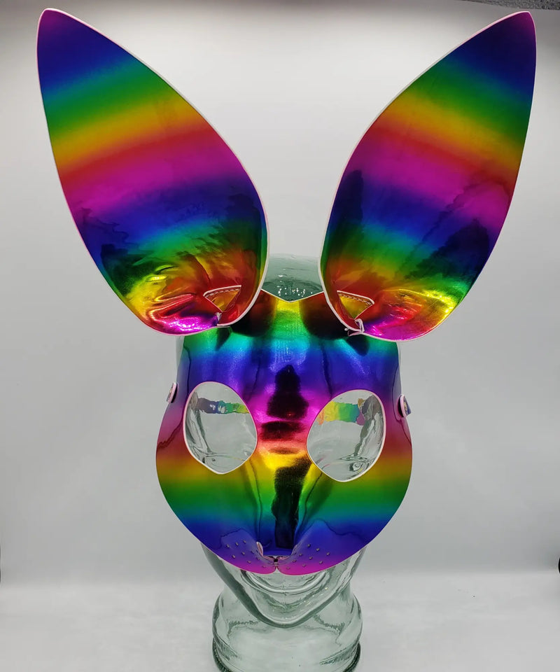 Exotic bunny mask with rainbow holographic iridescent surface and oversized reflective ears for costume use