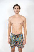 Men’s feather print swim shorts with vibrant blue and orange leaf pattern and black drawstring waistband