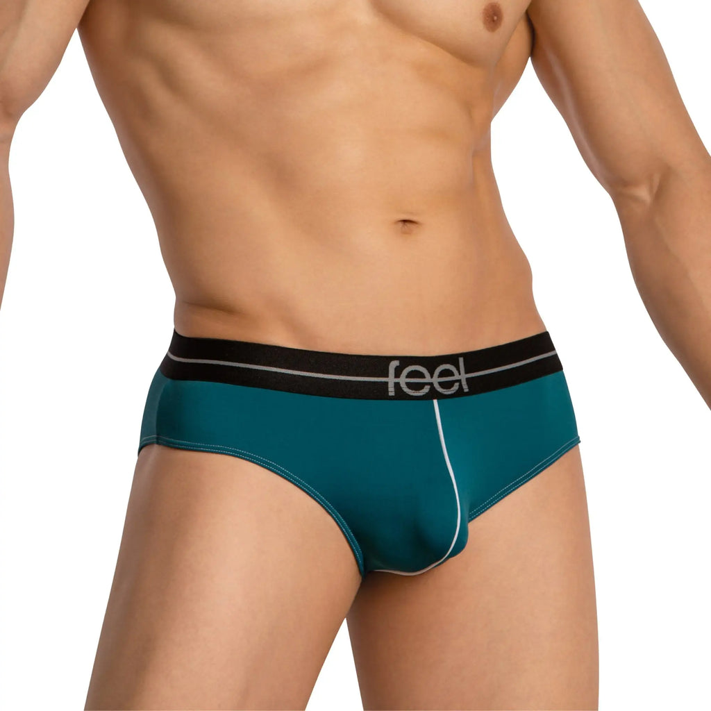 Teal men’s briefs with black waistband featuring feel logo in white from feel FEI025 bikini brief collection