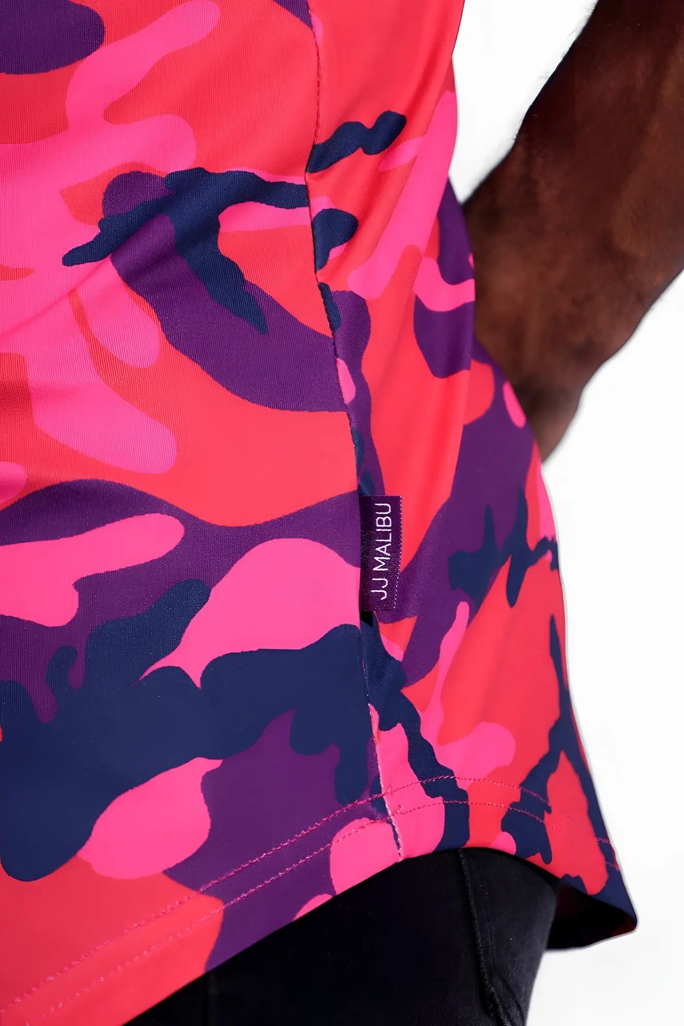 Feel-me scoop bottom tank in vibrant pink and purple camouflage with sleeveless design and black jj malibu brand tag