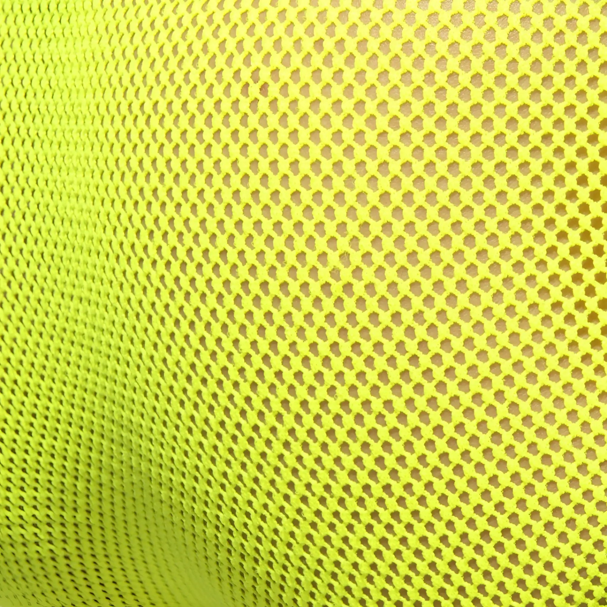 Bright neon yellow fever mesh brief with breathable hexagonal pattern mesh fabric for enhanced airflow