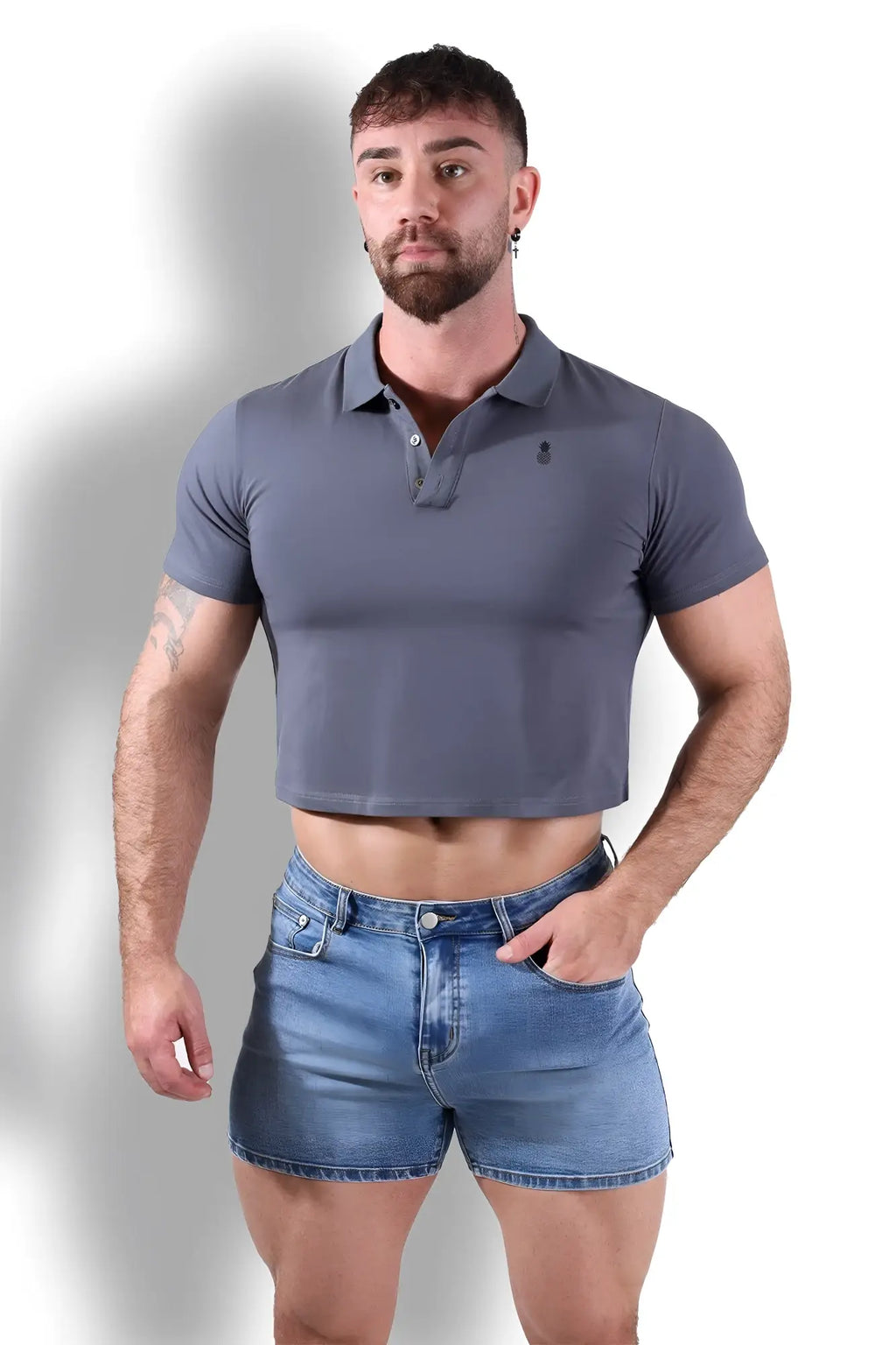 Fitted polo crop top in dark grey featuring a gray cropped design with a small embroidered chest logo