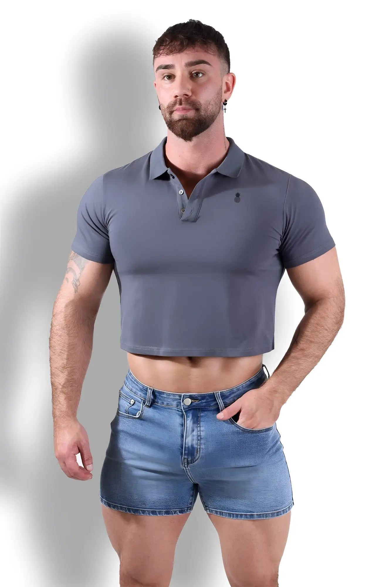 Fitted polo crop top in dark grey featuring a gray cropped design with a small embroidered chest logo