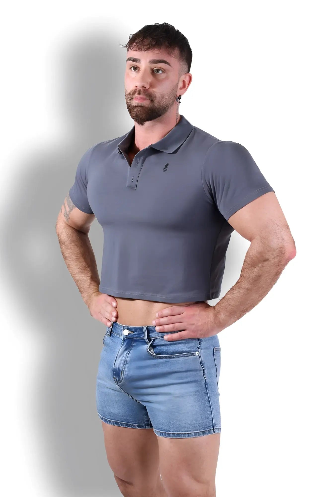 Fitted polo crop top dark grey with a small embroidered logo on the left chest in soft breathable fabric