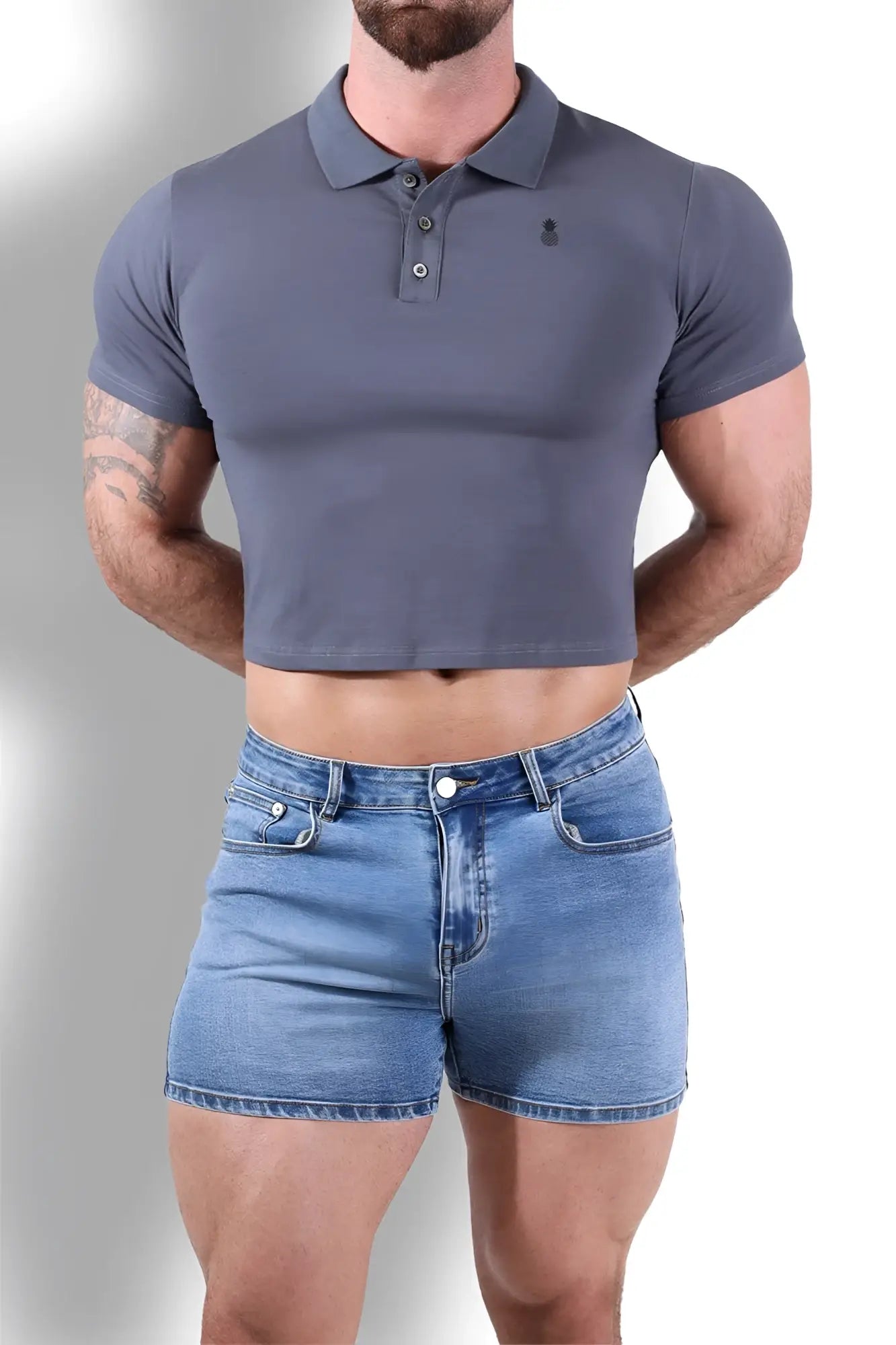 A fitted dark grey short-sleeved polo crop top with a classic collar and button placket