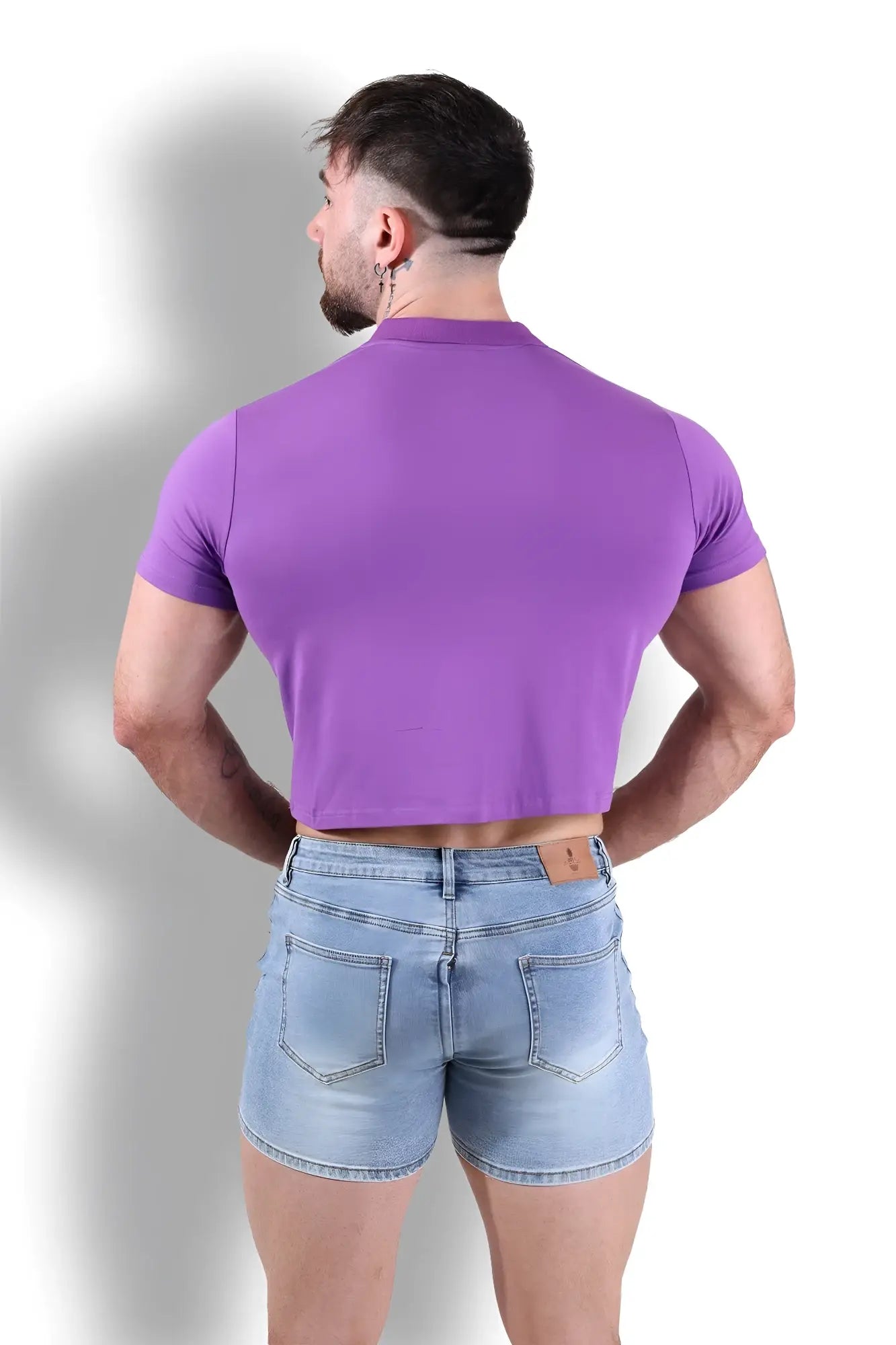 Purple fitted polo crop top with short sleeves made from soft stretchy fabric for casual wear