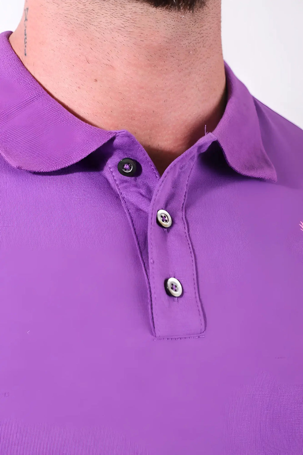 Fitted polo crop top purple with classic collar and three buttons featuring black and silver toned button details