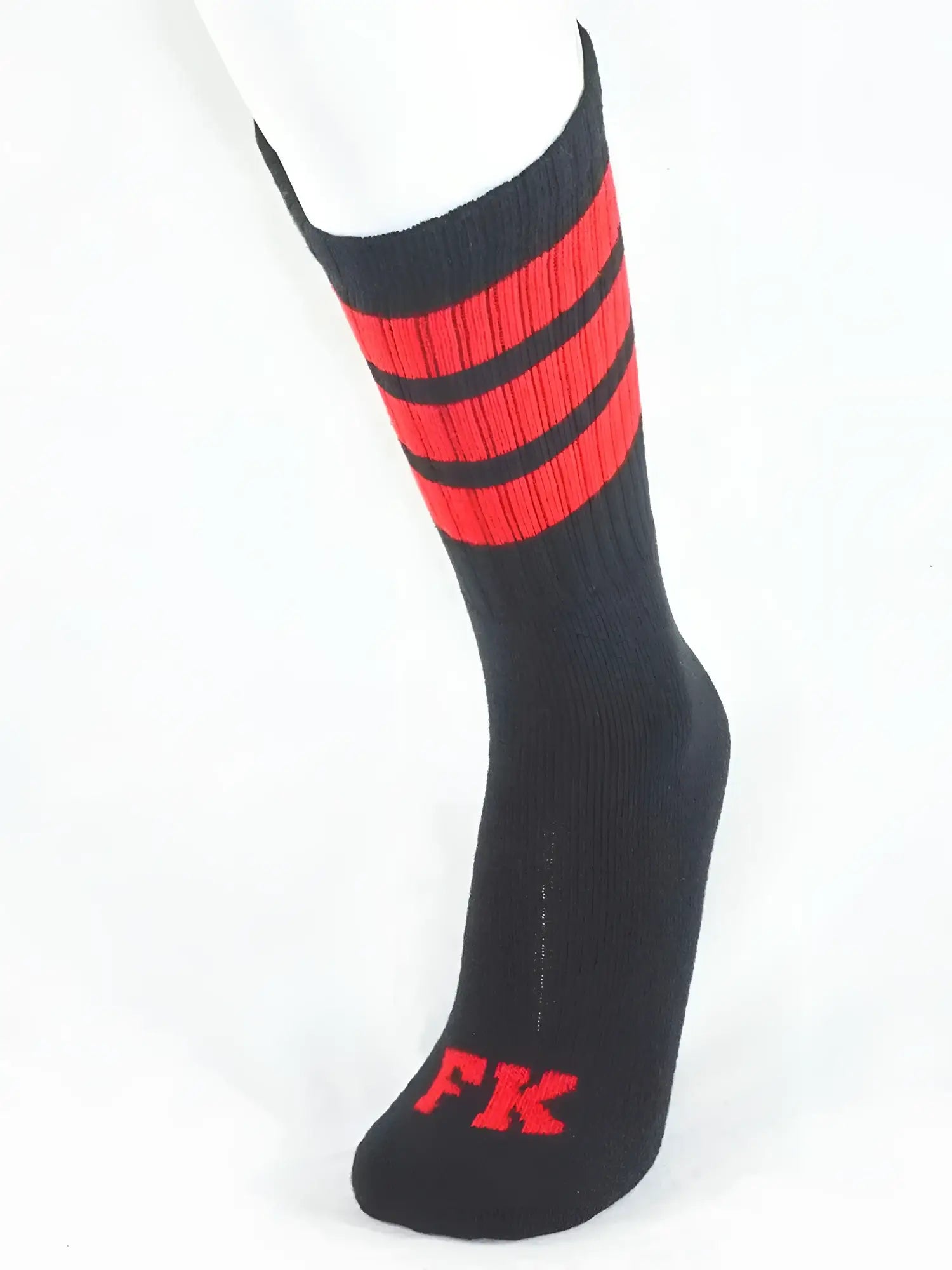 Black athletic tube sock with bold red stripes and matching fk logo on the toe for sports use
