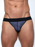 Dark blue fk sport penis print jock thong with white line drawing pattern and black elastic waistband back view