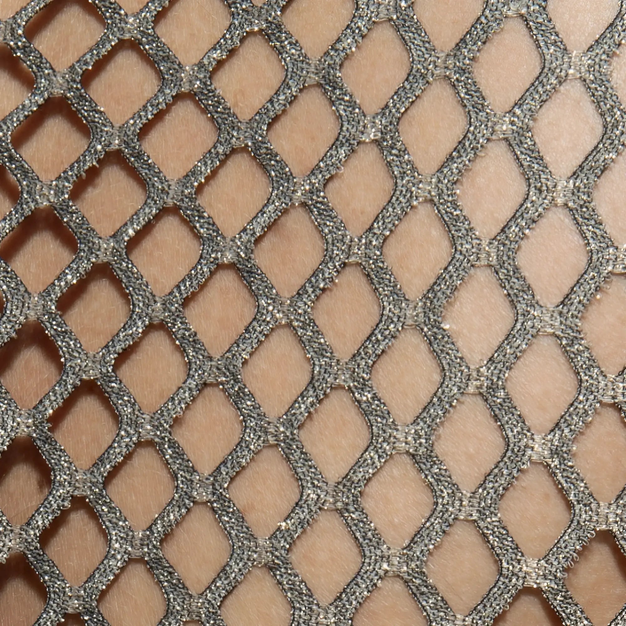 Flamboyant tank top made of silver glittery mesh fabric with a diamond-shaped lattice pattern