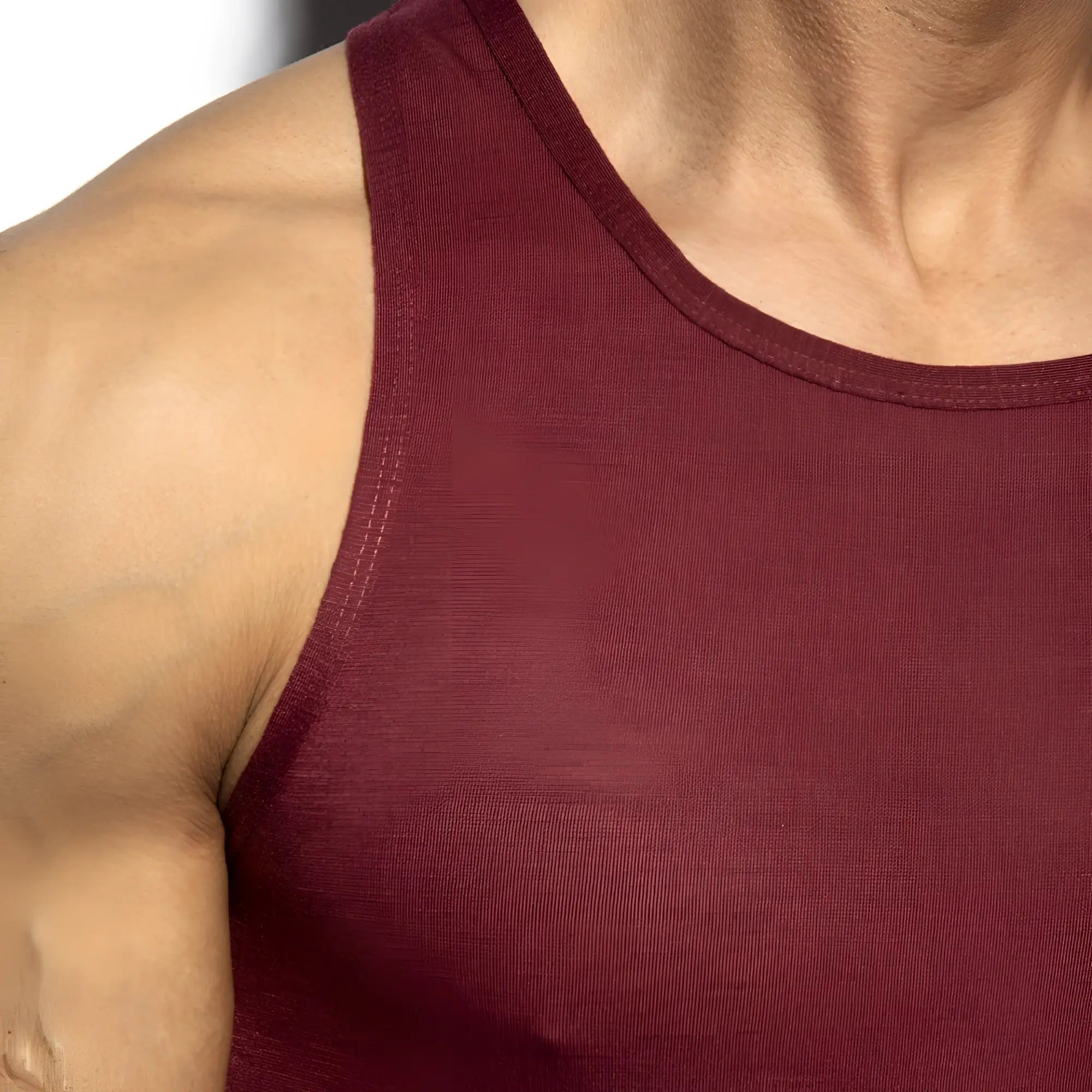 Maroon ribbed flame tank top with a simple round neckline made from soft stretch fabric for casual wear