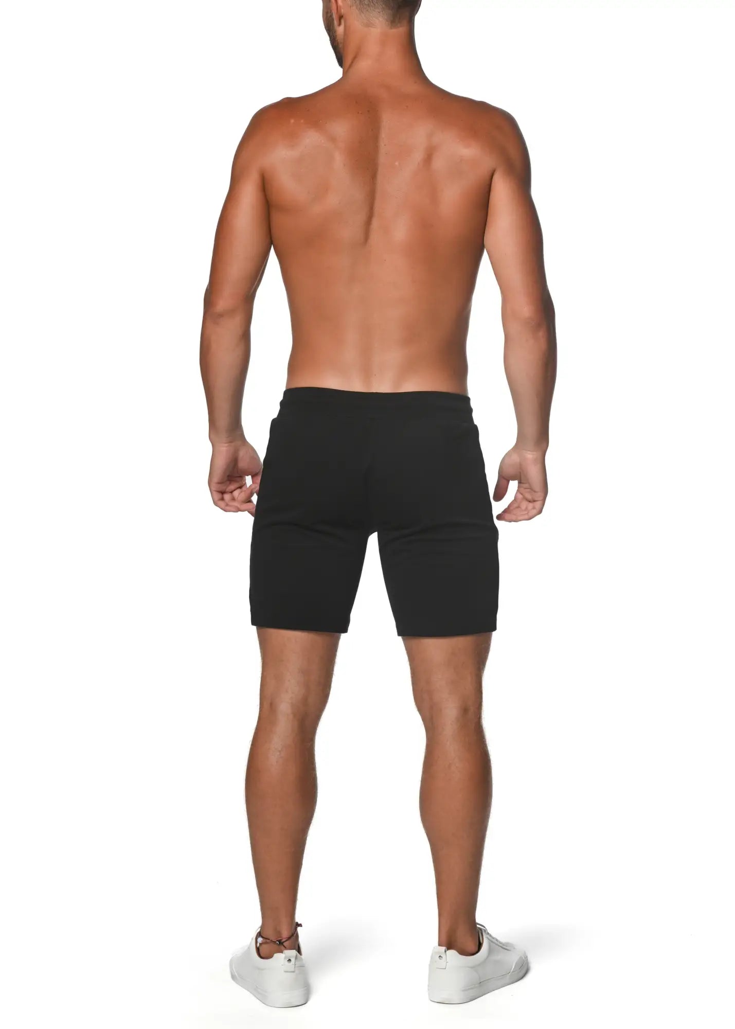 Black fleece flex-cotton stretch shorts with a sleek form-fitting design for athletic use