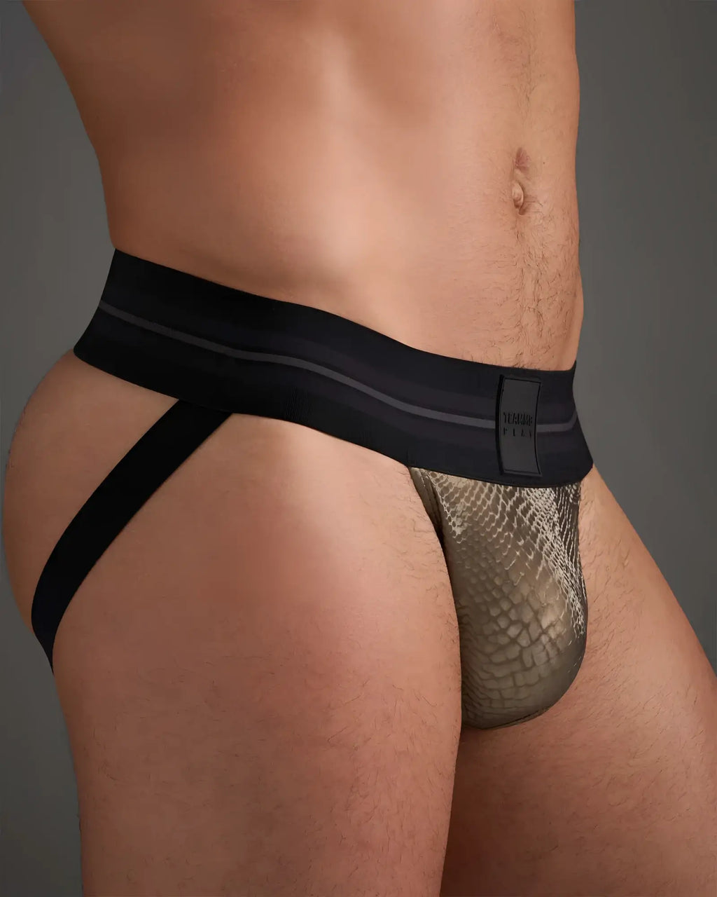 Flex jockstrap briefs featuring a sleek black and gold snake-skin pattern with modern design details