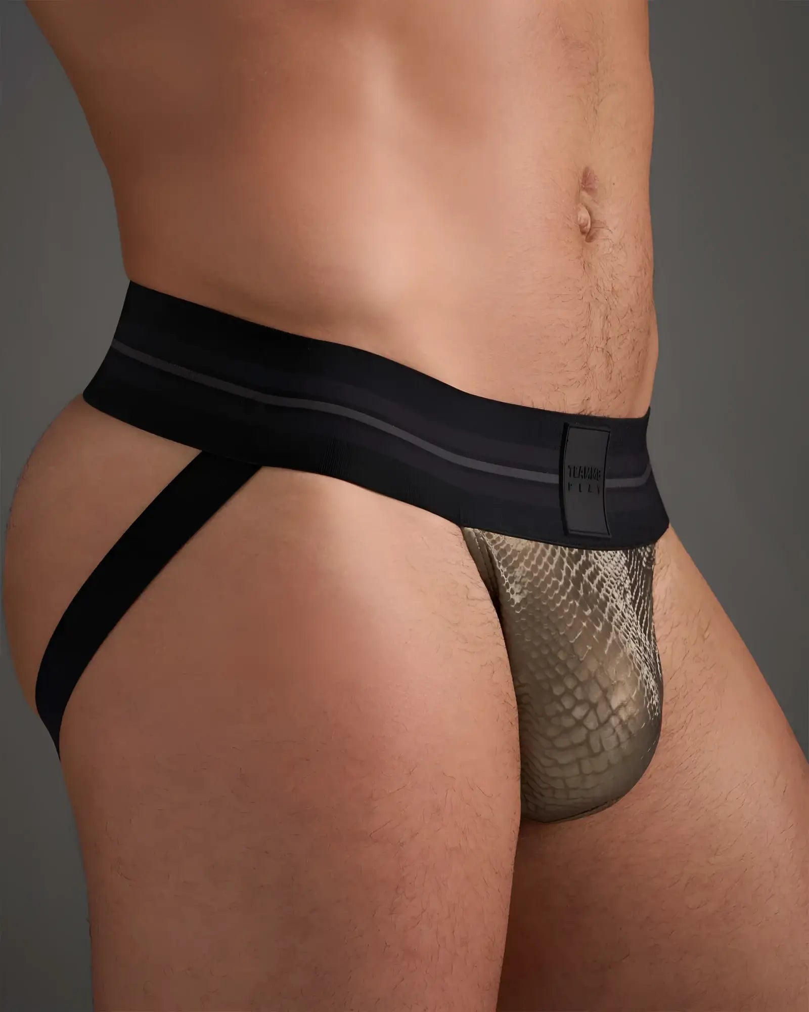 Flex jockstrap briefs featuring a sleek black and gold snake-skin pattern with modern design details